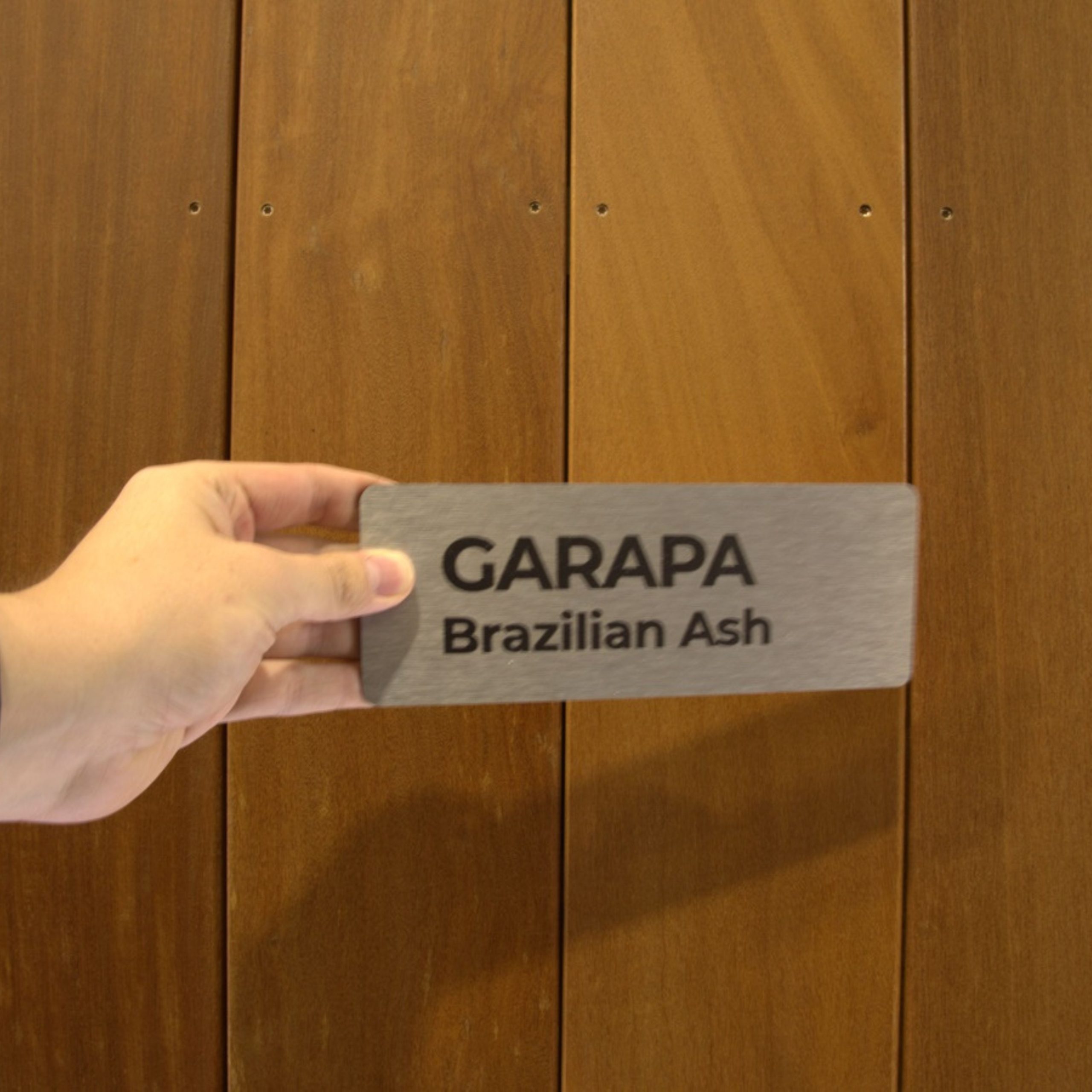 Garapa Wood Plank with a Sign